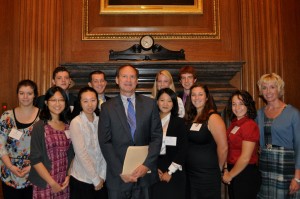 Justice Alito and Coach Kemper with IFE Interns.